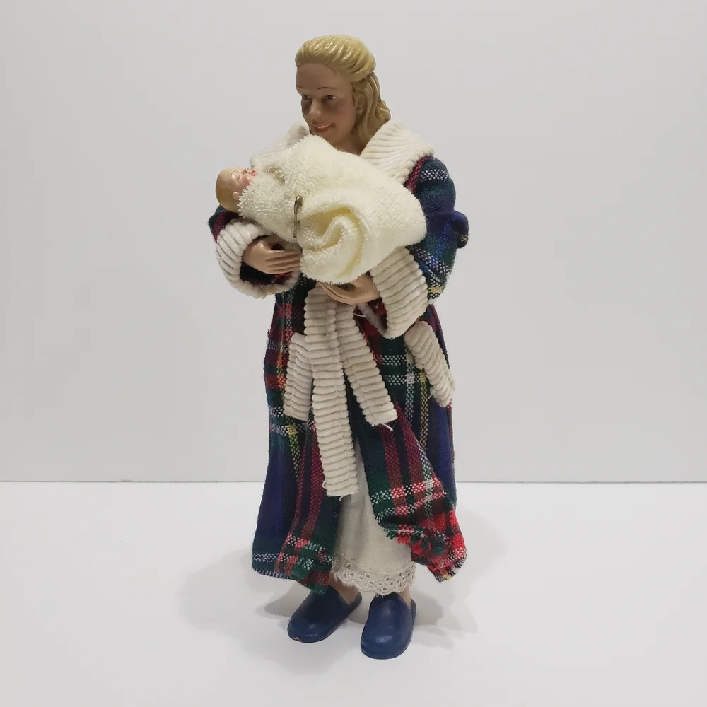 CLOTHTIQUE by Possible Dreams Man Woman and New Born Baby